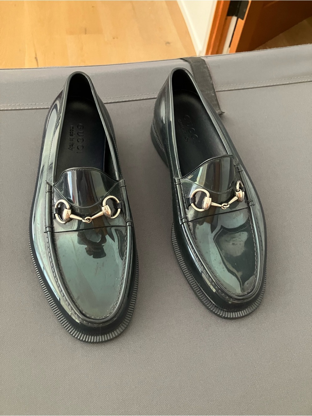 Gucci Navy Blue Rubberized
Loafers with Gold Horsebit